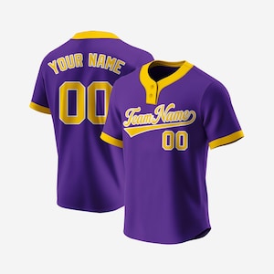May include: Purple baseball jersey with yellow trim and lettering. The jersey has "Your Name" and a number on the back, and "Team Name" and a number on the front.
