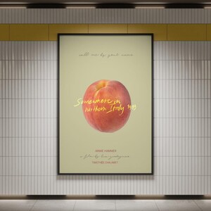 May include: A movie poster with a peach on a light green background. The text on the poster reads "call me by your name", "Somewhere in northern Italy 1983", "Armie Hammer", "a film by Luca Guadagnino", and "Timoth&eacute;e Chalamet".