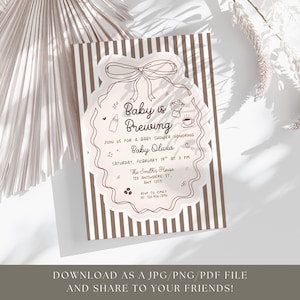 May include: A baby shower invitation with the text "Baby is Brewing" in a decorative frame. The invitation includes details for Baby Olivia's shower, with a date, time, and location. The design is light pink and brown.