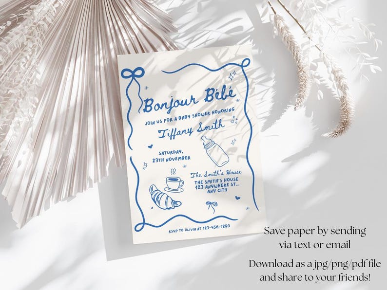 May include: A blue and white baby shower invitation with the text "Bonjour B&eacute;b&eacute;" and "Tiffany Smith". The invitation includes details for the event, including the date, time, and location.