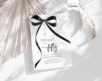 May include: A white invitation card with a black ribbon bow and the text "TIFFANY IS NOW fifty" and details for a party on December 14th at 4:00 PM. The invitation is on a white background with a shadow of a palm leaf.
