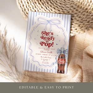 May include: A baby shower invitation with a vintage design. The invitation features the text "She's Ready to Pop!" in red and white, with a drawing of a cola bottle. The background has blue and white stripes.