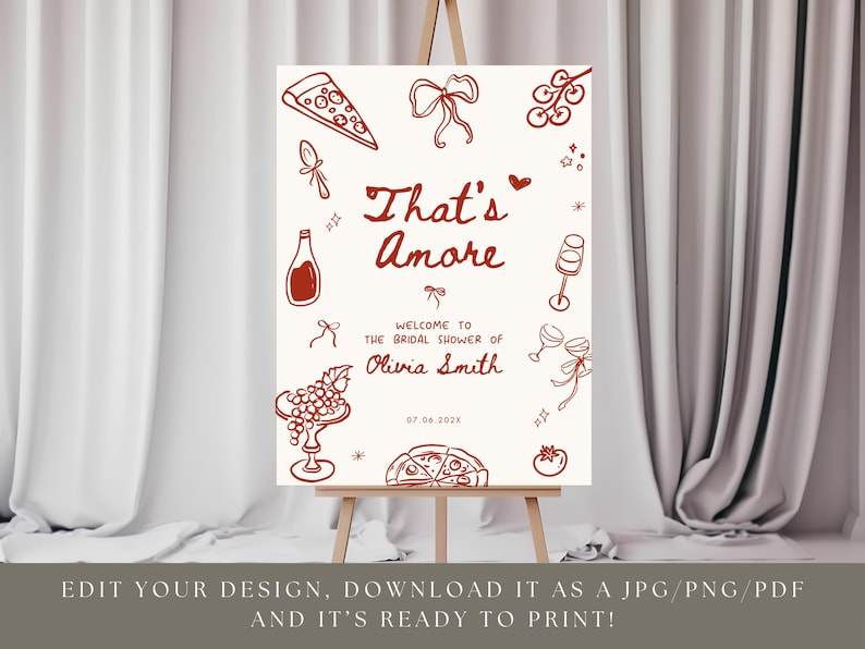May include: A sign on an easel with the words "That's Amore" in red script, with illustrations of pizza, wine, and grapes. The sign welcomes guests to Olivia Smith's bridal shower on 07.04.2028. The sign is ready to print.