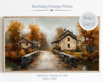 May include: A framed landscape print featuring a stone bridge leading to a house, surrounded by trees with autumn foliage. The artwork has a warm color palette of yellows, oranges, and browns. Text on the print reads "Berkeley Design Prints" and "Original Frame TV Art".