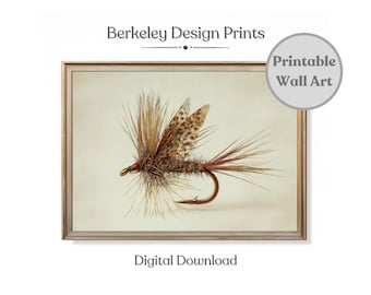 May include: A framed print featuring a detailed illustration of a fishing fly. The fly has brown, red, and tan elements with a curved hook. The print is labeled "Berkeley Design Prints" and "Digital Download."