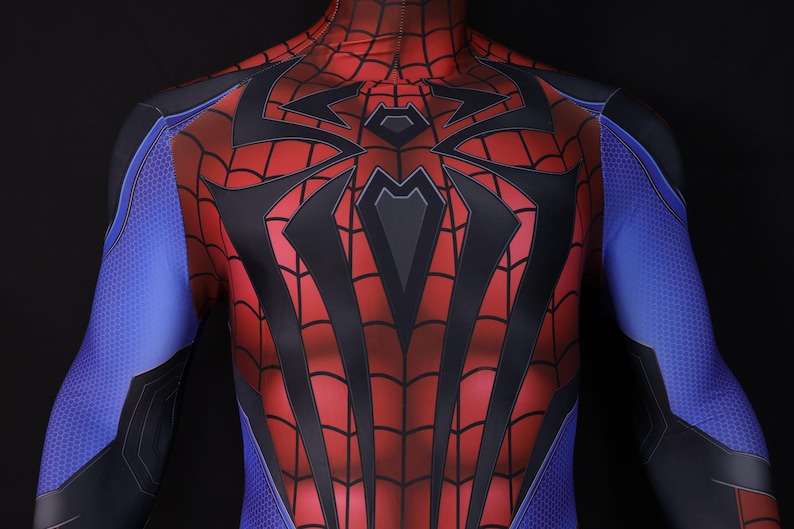 May include: A red and black Spider-Man costume with a web pattern design. The costume features blue accents on the arms and shoulders. The chest area has a large black spider emblem.
