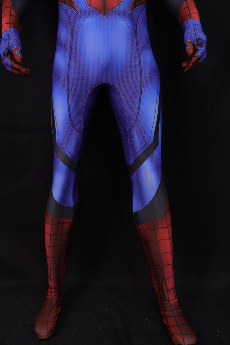 May include: A blue and red superhero costume with a web pattern on the lower legs and feet. The costume has a blue torso with black accents and red gloves. The overall design is a close-fitting, full-body suit.