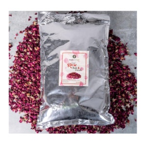 May include: A silver resealable bag filled with dried rose buds and petals. The bag has a label that reads "Dried Rose Buds & Petals" with a small image of a rose.