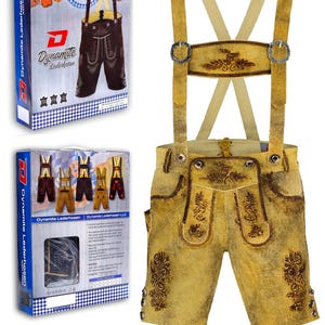 May include: A pair of traditional lederhosen with suspenders. The shorts are tan leather with decorative stitching and embroidery. The suspenders are light tan with metal buckles. The product is displayed with its packaging, which features the brand name "Dynamite Lederhosen."