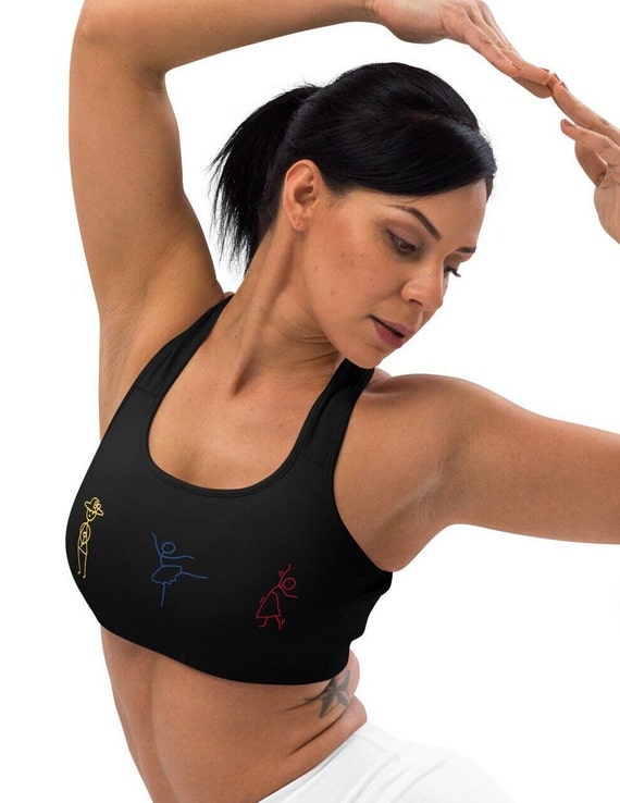 Black with stick characters Padded sports bra, Other than toning up on size a padded bra also adds support to your form