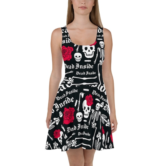 Sports Dress, a short dress with a fitted waist and a skirt that flares into an A-line shape.