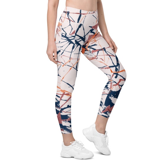 white with splash colors Leggings with pockets, They are designed for comfort, elasticity and softness. Can be worn as stand-alone garments