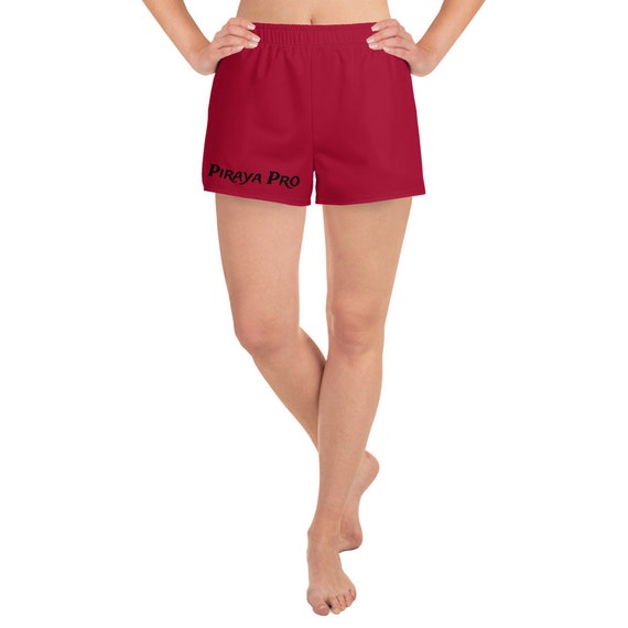 Red Women’s Athletic Shorts with Piraya Pro print, made out of fabrics that allow for maximum comfort and ease