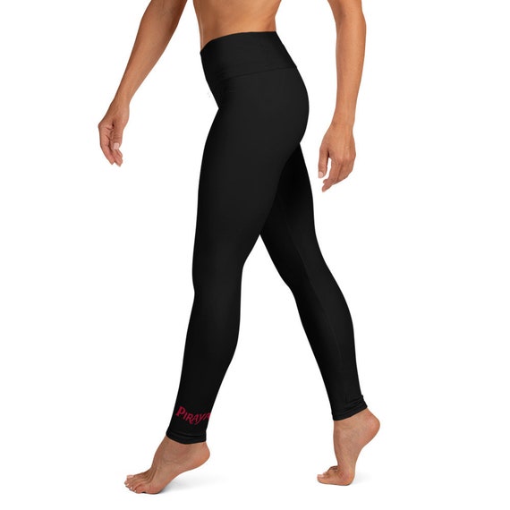 Black Yoga Leggings with small  red Piraya print on bottom of left leg