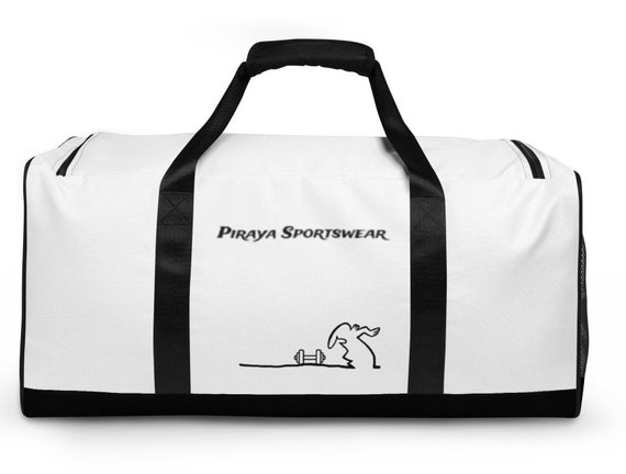 La Linea on the front and back of the Duffle bag, a large, cylindrical bag, for carrying personal belongings, great for gym or traveling