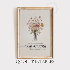 May include: A framed print featuring a bouquet of wildflowers in shades of pink, yellow, and red. The text "His mercies are new every morning" is displayed in elegant script, with the words "Qool Printables" at the bottom.