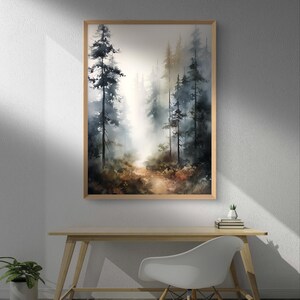 May include: A watercolor painting of a forest path with tall trees on either side. The path leads into the distance, where the trees are obscured by fog. The painting is framed in a light wood frame.