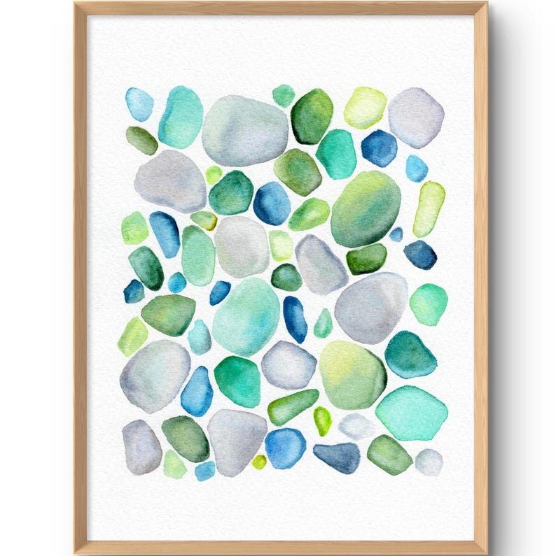 Watercolor painting of various sized stones in shades of blue, green, and gray. The stones are arranged on a white background. The artwork has a natural, organic theme.