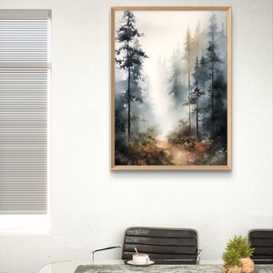 May include: A watercolor painting of a forest path with tall trees on either side. The path leads into the distance, where the trees are obscured by fog. The painting is framed in a light wood frame.