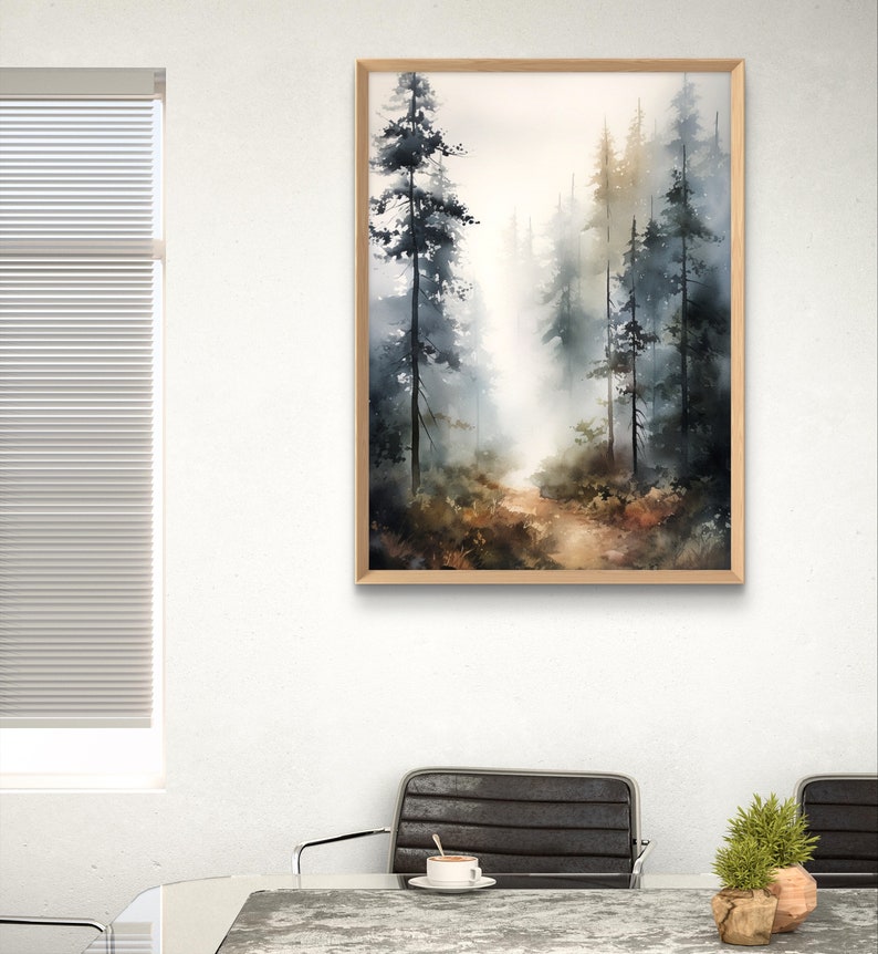 May include: A watercolor painting of a forest path with tall trees on either side. The path leads into the distance, where the trees are obscured by fog. The painting is framed in a light wood frame.