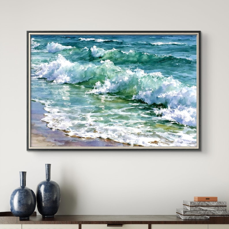 May include: A framed horizontal wall art print depicting a seascape with rolling ocean waves in shades of teal, turquoise, and deep blue, featuring white sea foam cresting as the water washes onto a sandy shore in a realistic painterly style.