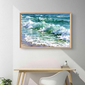 May include: A rectangular framed wall art print featuring a realistic painting of ocean waves crashing onto a sandy shore. The artwork displays vibrant shades of turquoise, deep blue, and white sea foam, enclosed in a light-toned wooden frame.