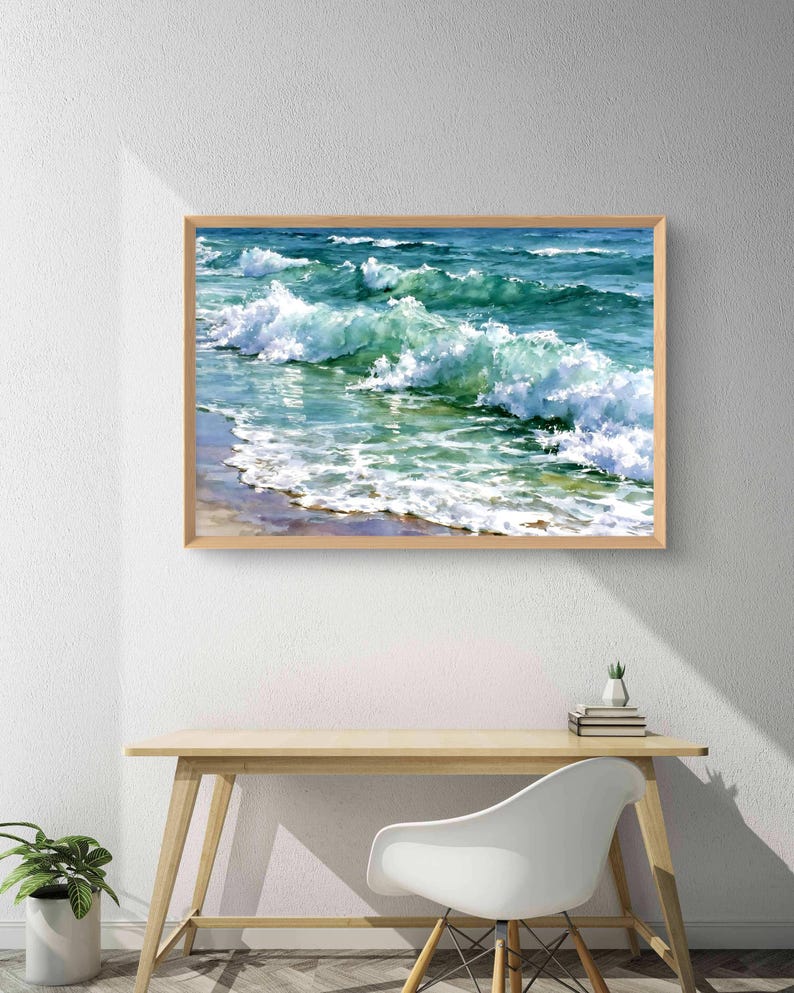 May include: A rectangular framed wall art print featuring a realistic painting of ocean waves crashing onto a sandy shore. The artwork displays vibrant shades of turquoise, deep blue, and white sea foam, enclosed in a light-toned wooden frame.