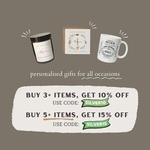 May include: A collage of personalized gifts for all occasions. The image features a candle, a card, and a mug. The candle is a white jar with a pink label that says "Happy Birthday". The card is a white card with a brown border and a colorful illustration of animals. The mug is white with a black and green design that says "Arthur The Legend 1965". The image also includes text that says "Buy 3+ items, get 10% off. Use code: SILVER10" and "Buy 5+ items, get 15% off. Use code: SILVER15".
