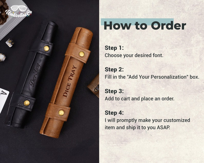 May include: Two personalized leather dice trays, one brown and one black, with the text "Dice Tray" engraved on them. The trays are rolled up and have a gold button closure. The image includes instructions on how to order a personalized dice tray.