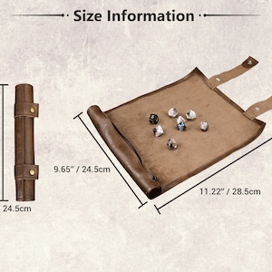 May include: Brown leather dice rolling tray with a zipper closure and two straps. The tray measures 11.22 inches by 28.5 centimeters and is rolled up to 9.65 inches by 24.5 centimeters.