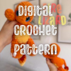 May include: Two orange and yellow crochet lizard plush toys with large blue eyes and white accents on the feet. The text Digital LIZARD CROCHET pattern is overlaid in white and yellow. The toys feature a textured yarn construction and rounded shapes.