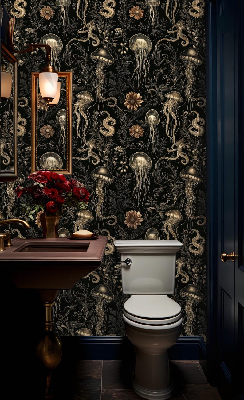May include: A black and gold bathroom with a toilet and a sink. The walls are covered in wallpaper with a pattern of jellyfish and seahorses.