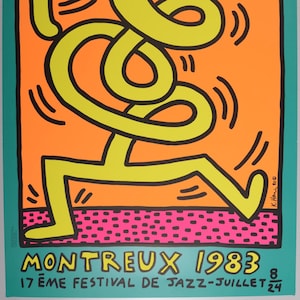 Puede incluir: Una figura amarilla con contornos negros baila sobre un fondo naranja con l&iacute;neas negras. La figura est&aacute; rodeada por un patr&oacute;n de lunares rosa y blanco. El texto "MONTREUX 1983 17EME FESTIVAL DE JAZZ-JUILLET 8 24" est&aacute; en la parte inferior del p&oacute;ster.