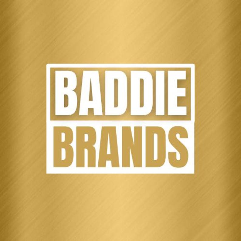 May include: A white rectangle with the text "BADDIE BRANDS" in black letters on a gold background.