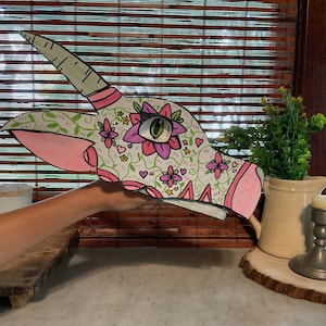 Marioneta de mano de dragón de papel con temática de flores y plantas