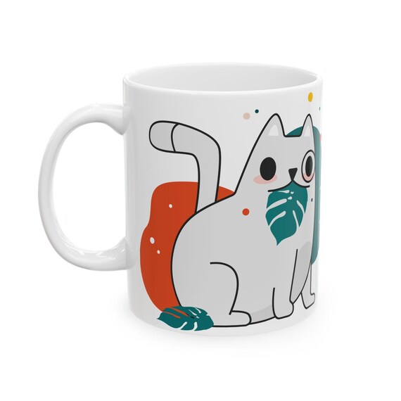 Charming cat sitting with a leaf design| Christmas Gift |great for morning coffee breaks| a delightful gift for animal enthusiasts.