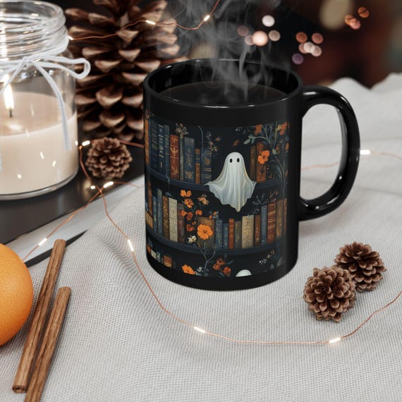 Halloween Coffee Mug: Ghost and Bookshelf Floral Design - Black Ceramic