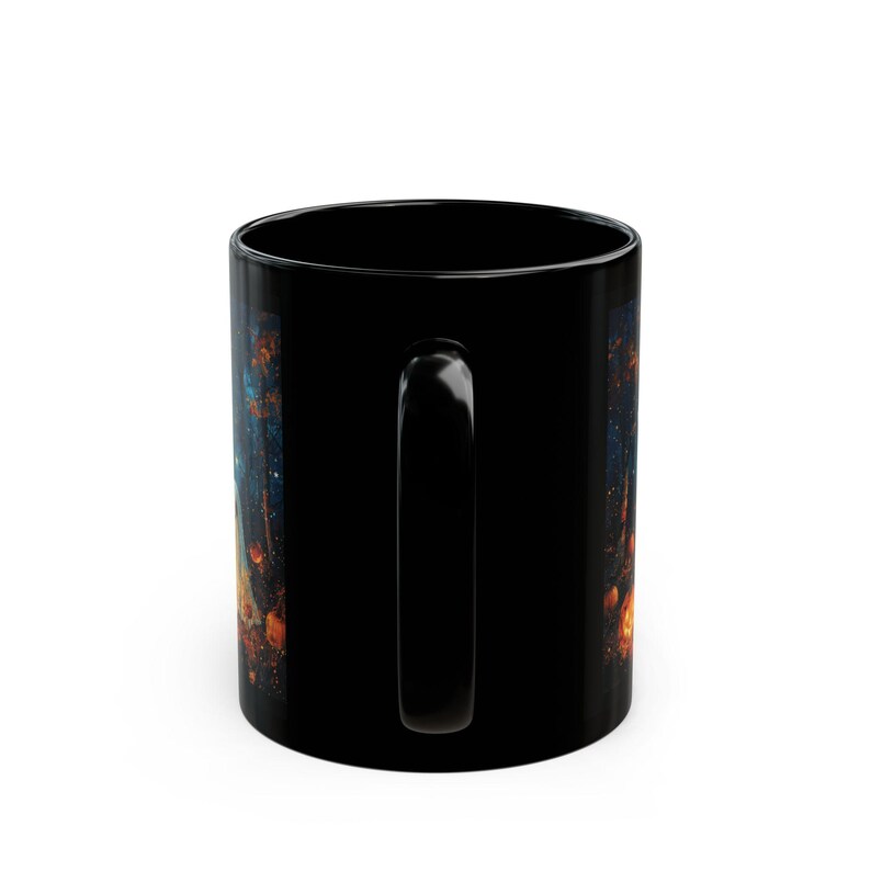 back of 11 oz right night full of stars, ghosts, pumpkins, and shadow figures in the night mug for Halloween