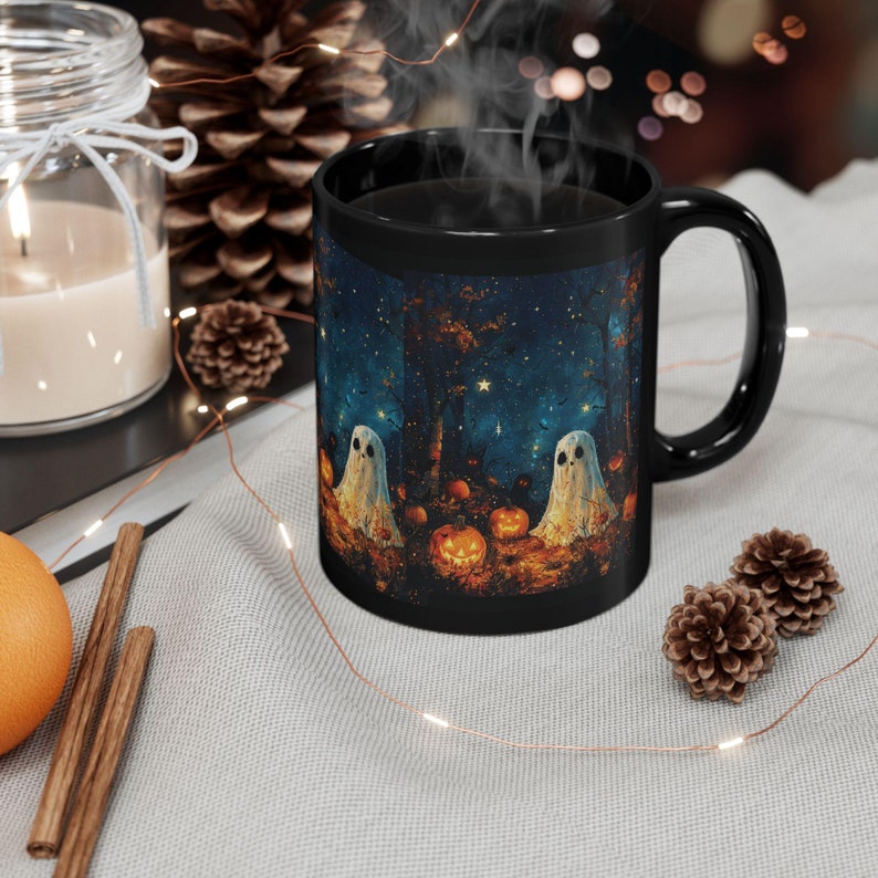 night full of stars, ghosts, pumpkins, and shadow figures in the night mug for halloween .