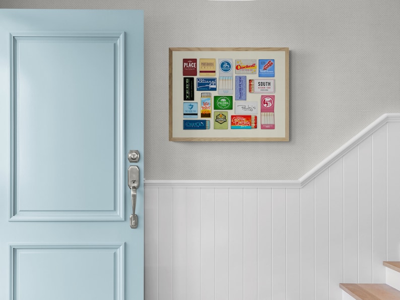 May include: A framed collage of vintage matchbox labels, featuring a variety of designs and colors. The labels are arranged in a grid pattern and include brands like "Place", "Cardinal", and "South".