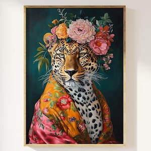 May include: A leopard with a floral crown and a colorful patterned shawl, against a teal background.