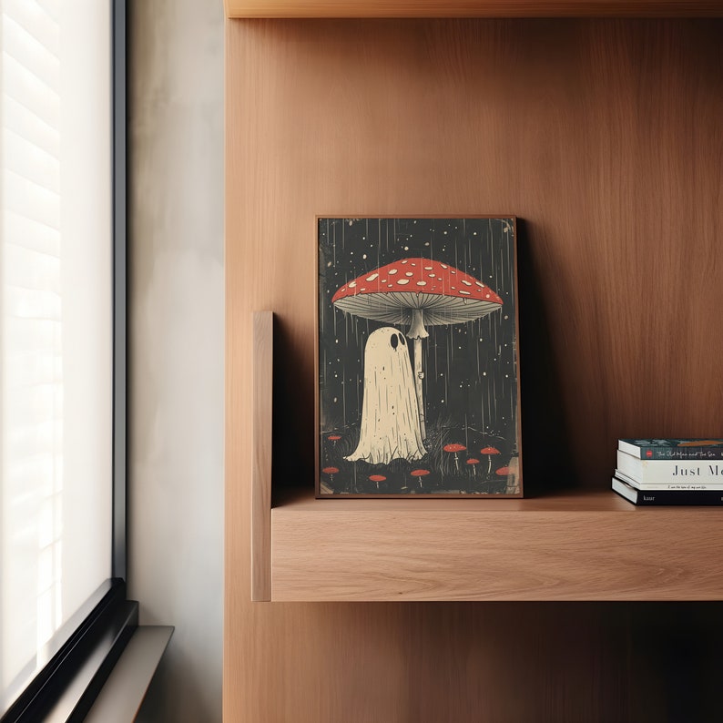 'Boo's Mushroom Umbrella'
In this endearing art print, a cute cartoon ghost finds solace from the rain under the protective cover of a whimsical mushroom.