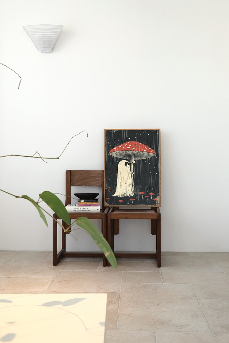 'Boo's Mushroom Umbrella'
In this endearing art print, a cute cartoon ghost finds solace from the rain under the protective cover of a whimsical mushroom.