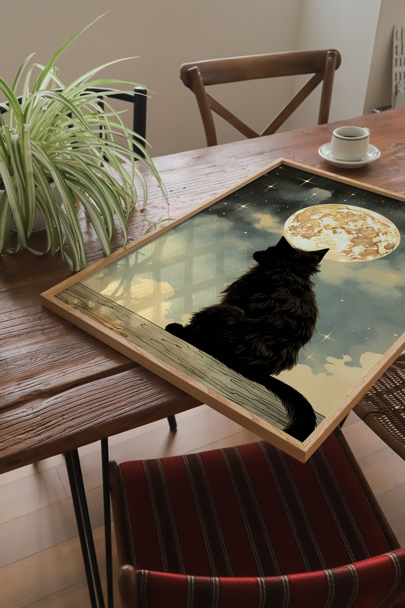 Introducting 'Moonlit Whiskers'
This magical art print captures the felines contemplation under the celestial embrace of the full moon. A gorgeous piece of art for anyone who appreciates the mystery of black cats and the full moon.