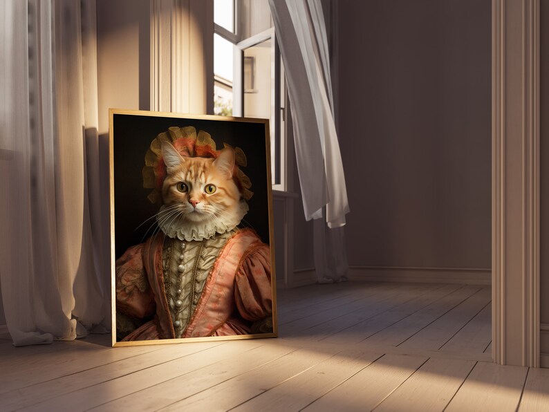 K&ouml;nnte beinhalten: Ein gerahmtes Portr&auml;t einer Katze, die ein rosa-wei&szlig;es R&uuml;schenkleid mit goldenem Rahmen tr&auml;gt.
