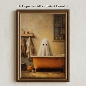 May include: A framed vintage-style painting depicts a ghost in a bathtub. The ghost is covered by a white sheet with two black eye holes. An orange bathtub, a carved pumpkin, and the text "TheDopamineGallery Instant Download" are also visible.
