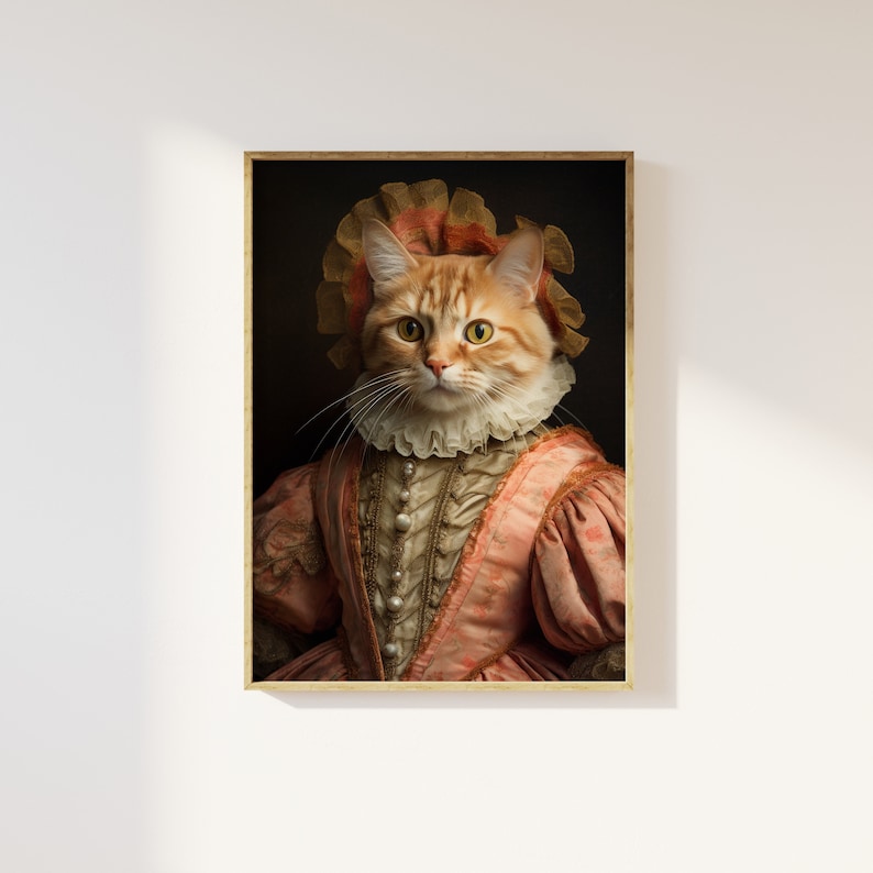 K&ouml;nnte beinhalten: Eine rotbraune Katze, die ein rosa und goldenes, gerafftes Kleid mit passendem Kopfschmuck tr&auml;gt. Die Katze schaut direkt auf den Betrachter.