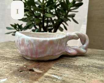 Pink and white dribble glaze mugs, pinch pot and bubble mugs