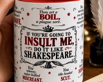May include: A white ceramic mug with a red interior featuring black and red text that reads: Thou art a BOIL, a plague sore. IF YOU'RE GOING TO INSULT ME, DO IT LIKE SHAKESPEARE. You spleeny, sugar-bellied MISCREANT. You idle-headed SCUT.