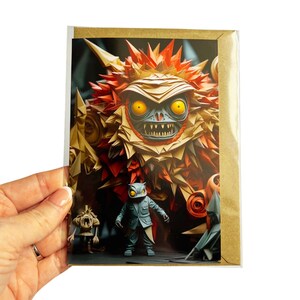 May include: A colorful, paper-like monster with sharp teeth and glowing yellow eyes stands over a smaller, blue creature wearing a suit. The monster is made of paper and has a red, orange, and yellow color scheme. The smaller creature is made of paper and has a blue and white color scheme.